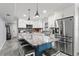 Stylish kitchen with island and stainless steel appliances at 10301 Gulf Blvd # 201, Treasure Island, FL 33706