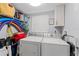 Updated laundry room with washer and dryer, and ample storage at 10301 Gulf Blvd # 201, Treasure Island, FL 33706