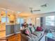 Comfortable living room showcases an open floor plan, ceiling fan, and inviting seating at 306 Friar Ct # B, Sun City Center, FL 33573