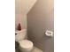 Simple bathroom with toilet and wall-mounted toilet paper holder at 2017 Pine Chace Ct, Tampa, FL 33613