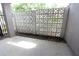 Private patio with concrete flooring and decorative block wall at 4611 W Fig St # 106, Tampa, FL 33609