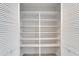 Spacious pantry with ample shelving for storage at 2206 Mayfield Palms Ln # 69, Sun City Center, FL 33573