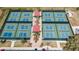 Expansive area with multiple well-maintained pickleball courts at 2206 Mayfield Palms Ln # 69, Sun City Center, FL 33573