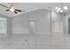 Spacious living room featuring tile floors and a neutral color palette at 2206 Mayfield Palms Ln # 69, Sun City Center, FL 33573
