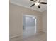 Spacious office with wood-look flooring and view of the living area at 2206 Mayfield Palms Ln # 69, Sun City Center, FL 33573