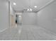 Dining room with neutral gray walls and tile floors at 2206 Mayfield Palms Ln # 69, Sun City Center, FL 33573