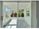 Bright sunroom with multiple windows and tile flooring at 2206 Mayfield Palms Ln # 69, Sun City Center, FL 33573