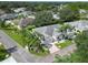 Aerial view showing home's exterior, landscaping, and community setting at 2206 Mayfield Palms Ln # 69, Sun City Center, FL 33573