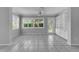 Dining area with built-in shelving and window seat at 2206 Mayfield Palms Ln # 69, Sun City Center, FL 33573