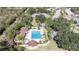 Community pool with gazebo and surrounding lounge area at 2206 Mayfield Palms Ln # 69, Sun City Center, FL 33573