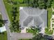 Aerial view of home showcasing roofline, landscaping, and driveway at 2206 Mayfield Palms Ln # 69, Sun City Center, FL 33573