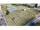 Community bocce ball courts with covered seating areas at 2206 Mayfield Palms Ln # 69, Sun City Center, FL 33573