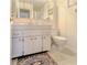Clean bathroom with vanity, toilet and shower at 306 Friar Ct # B, Sun City Center, FL 33573