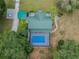 Overhead view of the house, pool, and property at 11401 Thonotosassa Rd, Thonotosassa, FL 33592