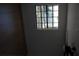Light and airy bedroom featuring wood-look floors and a bright window at 1503 N Conrad Ave, Sarasota, FL 34237