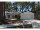 Charming single Gathering home featuring a two-car garage and freshly painted exterior at 1503 N Conrad Ave, Sarasota, FL 34237