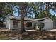 Charming single Gathering home featuring a two-car garage and freshly painted exterior at 1503 N Conrad Ave, Sarasota, FL 34237
