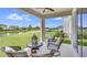 Relaxing covered patio overlooking a pond at 16013 7Th E Ave, Bradenton, FL 34212