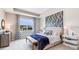 Spacious main bedroom with a plush bed and plenty of natural light at 668 157Th E Ct, Bradenton, FL 34212