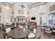 Community room with tables, chairs, and a bar area at 2220 Chianti Pl # 8-0812, Palm Harbor, FL 34683