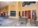 Community patio with seating and pool view at 2220 Chianti Pl # 8-0812, Palm Harbor, FL 34683