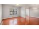 Living room with hardwood floors and ceiling fan at 2220 Chianti Pl # 8-0812, Palm Harbor, FL 34683