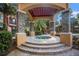 Relaxing hot tub with pergola cover at 2220 Chianti Pl # 8-0812, Palm Harbor, FL 34683