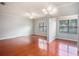 Spacious living room with hardwood floors and lots of light at 2220 Chianti Pl # 8-0812, Palm Harbor, FL 34683