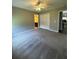 Bedroom featuring neutral paint, carpet, and large closet at 12384 Creek Edge Dr, Riverview, FL 33579