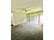 Neutral bedroom with carpet, ceiling fan and closet at 12384 Creek Edge Dr, Riverview, FL 33579