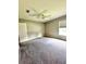 Spacious bedroom with natural light, ceiling fan, closet and neutral paint at 12384 Creek Edge Dr, Riverview, FL 33579