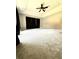 Spacious bedroom with vaulted ceilings and dark curtains at 12384 Creek Edge Dr, Riverview, FL 33579