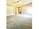 Large carpeted bedroom with ceiling fan, and plenty of natural light at 12384 Creek Edge Dr, Riverview, FL 33579