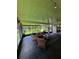 Comfortable enclosed patio with patio furniture and peaceful outdoor views at 12384 Creek Edge Dr, Riverview, FL 33579