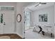 Bright dining room with modern decor and a view, located next to the entry at 2309 Mooney. Pl, Sun City Center, FL 33573