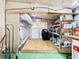 Spacious unfinished basement storage area with shelving and overhead storage providing ample room for all your belongings at 35801 Verda Dr, Zephyrhills, FL 33541