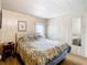 Bright bedroom featuring a comfy bed, natural lighting and a closet at 35801 Verda Dr, Zephyrhills, FL 33541