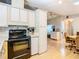 Functional kitchen with a view into the living area at 35801 Verda Dr, Zephyrhills, FL 33541