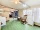 Spacious laundry room with a washing machine and ample storage space at 35801 Verda Dr, Zephyrhills, FL 33541