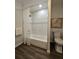 Modern bathroom featuring a shower-tub, new fixtures, and a toilet at 3763 Dartmouth N Ave, St Petersburg, FL 33713