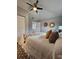 Bright bedroom featuring a ceiling fan, neutral walls, and a view of the doorway at 3763 Dartmouth N Ave, St Petersburg, FL 33713