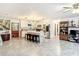 Open concept kitchen with island, stainless steel appliances, and white cabinetry at 4300 41St N St, St Petersburg, FL 33714