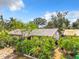 Single story home with lush landscaping and brick driveway at 4300 41St N St, St Petersburg, FL 33714