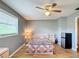 Bedroom with wood floors and mini fridge at 4300 41St N St, St Petersburg, FL 33714