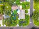 Aerial view showing home, lush landscaping, and property lines at 4300 41St N St, St Petersburg, FL 33714