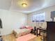 Small bedroom with a single bed and desk at 4300 41St N St, St Petersburg, FL 33714