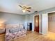 Bedroom with wood floors and mini fridge at 4300 41St N St, St Petersburg, FL 33714