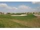 Picturesque golf course with a sand trap at 2447 Nantucket Harbor Loop # 112, Sun City Center, FL 33573