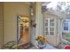Screened porch entryway with view into the kitchen at 2447 Nantucket Harbor Loop # 112, Sun City Center, FL 33573