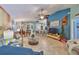 Open living area with vaulted ceiling and tile floors at 2447 Nantucket Harbor Loop # 112, Sun City Center, FL 33573